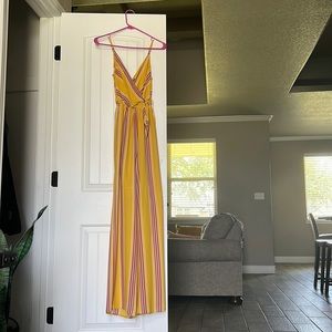 Express yellow jumpsuit with front bow tie
